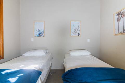 Casa de Temporada em Guaratuba - fotografia imobiliaria profissional para airbnb e booking de uma casa em bertioga por fernando freire fotografo de imoveis baixada santista e praia'