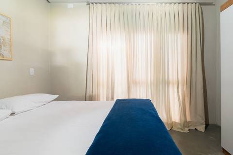 Casa de Temporada em Guaratuba - fotografia imobiliaria profissional para airbnb e booking de uma casa em bertioga por fernando freire fotografo de imoveis baixada santista e praia'