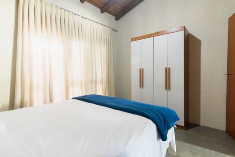Casa de Temporada em Guaratuba - fotografia imobiliaria profissional para airbnb e booking de uma casa em bertioga por fernando freire fotografo de imoveis baixada santista e praia'