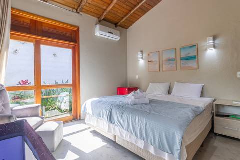 Casa de Temporada em Guaratuba - fotografia imobiliaria profissional para airbnb e booking de uma casa em bertioga por fernando freire fotografo de imoveis baixada santista e praia'