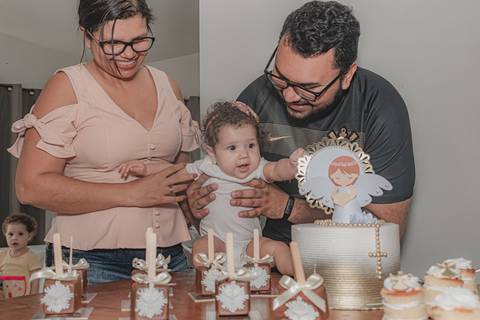 Mas também houve festejo para comemorar o batismo.'