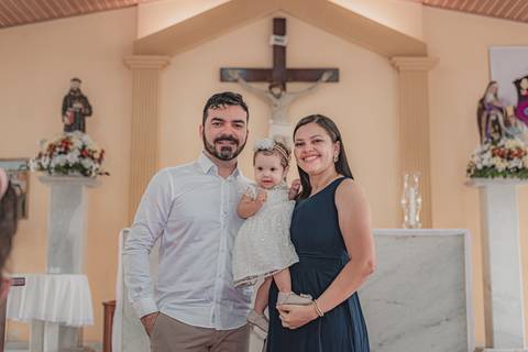 Os padrinhos, figuras imprescindíveis no batismo.'