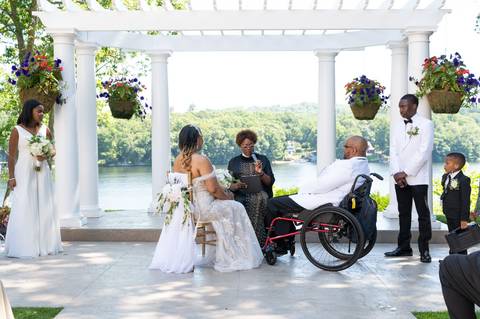 Photo by Vanessa Trettel,
Wedding photographer on location at The Water View, Monroe, CT in July 2022.
It's an image of the bride and groom sharing their first kiss.'