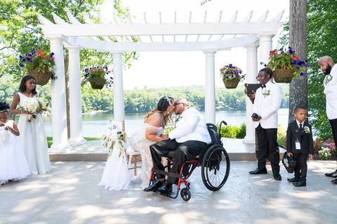 Photo by Vanessa Trettel,
Wedding photographer on location at The Water View, Monroe, CT in July 2022.
It's an image of the bride and groom sharing their first kiss.'