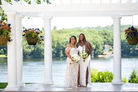 Photo by Vanessa Trettel,
Wedding photographer at Venue The Water View, Monroe, CT in July 2022.
It is an image of the bride and her daughter standing with the bouquet'