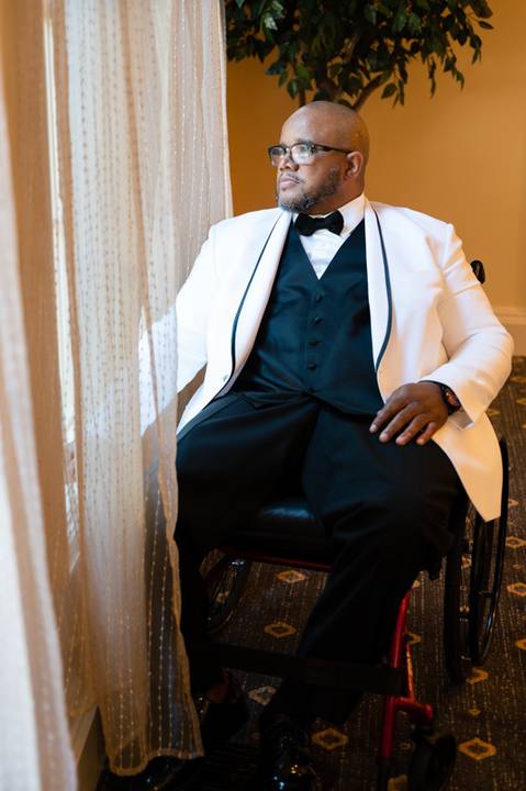 Photo by Vanessa Trettel,
Onsite wedding photographer at The Water View, Monroe, CT in July 2022.
It is an image of the groom in his wheelchair.'