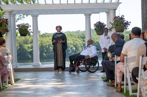 Photo by Vanessa Trettel,
Onsite wedding photographer at The Water View, Monroe, CT in July 2022.
It is an image of the groom in his wheelchair at The Water View Venue in Monroe, CT'