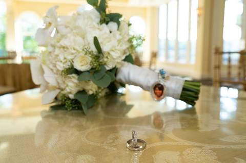 Photo by Vanessa Trettel,
Onsite wedding photographer at The Water View, Monroe, CT in July 2022.
It is an image of the ring and the bouquet.'