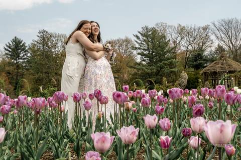 A radiant spring scene unfolds at Elizabeth Park, where Katie & Michaela share a tender embrace amidst vibrant tulips, capturing the essence of their simple yet meaningful wedding.
Gay Wedding
Lesbian wedding pictures
gay wedding photographer
Vanessa Tret'