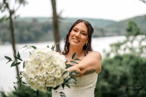 A jubilant wedding reception at The Waterview in Monroe, CT. The bride and groom dance the night away, surrounded by cheering guests. The energy is electric as the celebration continues, perfectly capturing the spirit of Briana & Nicholas’s love story.'