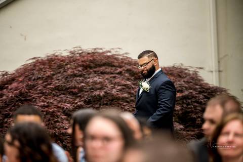 A jubilant wedding reception at The Waterview in Monroe, CT. The bride and groom dance the night away, surrounded by cheering guests. The energy is electric as the celebration continues, perfectly capturing the spirit of Briana & Nicholas’s love story.'
