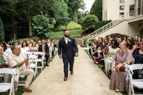 Briana shares a heartfelt First Look with her father at The Waterview in Monroe, CT. Her father’s eyes light up as he sees her in her wedding dress for the first time, capturing an unforgettable, emotional moment filled with love and pride.'