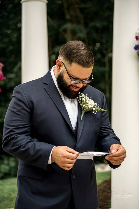 A jubilant wedding reception at The Waterview in Monroe, CT. The bride and groom dance the night away, surrounded by cheering guests. The energy is electric as the celebration continues, perfectly capturing the spirit of Briana & Nicholas’s love story.'