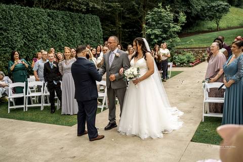 A jubilant wedding reception at The Waterview in Monroe, CT. The bride and groom dance the night away, surrounded by cheering guests. The energy is electric as the celebration continues, perfectly capturing the spirit of Briana & Nicholas’s love story.'