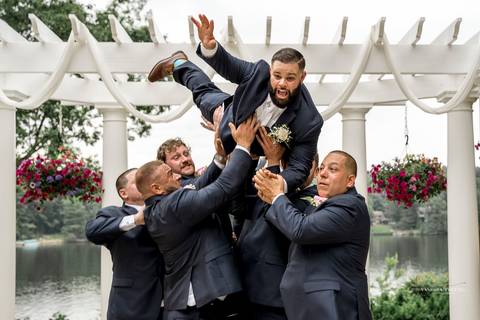Briana shares a heartfelt First Look with her father at The Waterview in Monroe, CT. Her father’s eyes light up as he sees her in her wedding dress for the first time, capturing an unforgettable, emotional moment filled with love and pride.'
