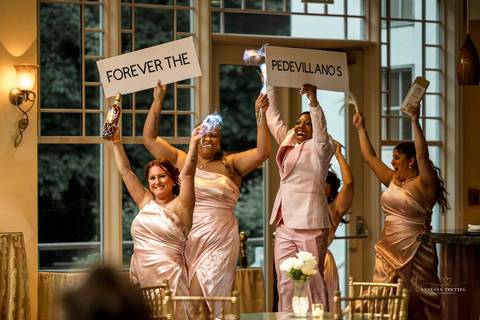 Captured in golden light, Briana & Nicholas steal a quiet moment together at The Waterview in Monroe, CT. The serene lake in the background enhances the romantic atmosphere as they embrace, lost in the love and joy of their special day.'