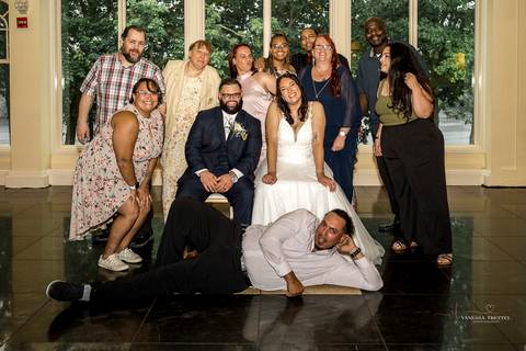 Captured in golden light, Briana & Nicholas steal a quiet moment together at The Waterview in Monroe, CT. The serene lake in the background enhances the romantic atmosphere as they embrace, lost in the love and joy of their special day.'