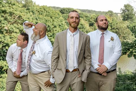 Groomsmen laugh together before the ceremony, dressed in classic navy suits. Relaxed and fun wedding vibes captured in Mystic, CT.
Vanessa Trettel best wedding photographer in CT
wedding photos Mystic CT'