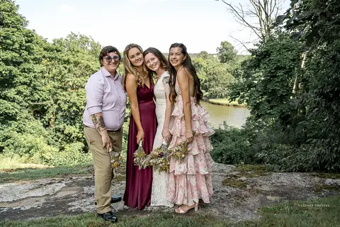 Bridesmaids in soft pastel dresses cheer as they see the bride for the first time. Light, joyful wedding moment in Connecticut summer sun.
Vanessa Trettel best wedding photographer in CT
wedding photos Mystic CT'