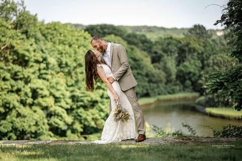 Bride and groom share a joyful kiss by the Mystic harbor, bathed in golden summer light. Coastal wedding in Connecticut with ocean breeze and romantic vibes.
Vanessa Trettel best wedding photographer in CT'