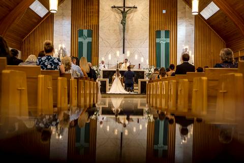 The couple shares their first kiss as newlyweds inside the church, surrounded by joyful guests.
Saint Therese Church at North Haven, CT
Vanessa Trettel Photography'