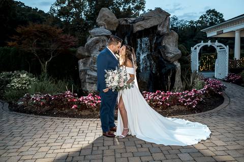 The couple poses for an artistic portrait at Cascade Fine Catering, surrounded by elegant summer light.
Cascade Fine Catering in Hamden, CT
Vanessa Trettel Photography'