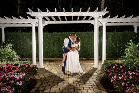 The newlyweds embrace under the night sky, creating a magical final portrait at Cascade Fine Catering.
Cascade Fine Catering in Hamden, CT
Vanessa Trettel Photography'