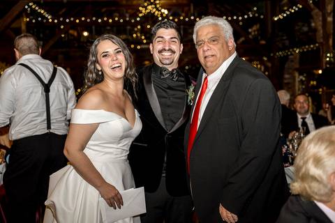 Laura and Lee’s joyful first dance beneath the twinkling lights of Bill Miller's Castle, as their family and friends cheer in the cozy reception hall.
Vanessa Trettel 
best wedding photographer in CT
'
