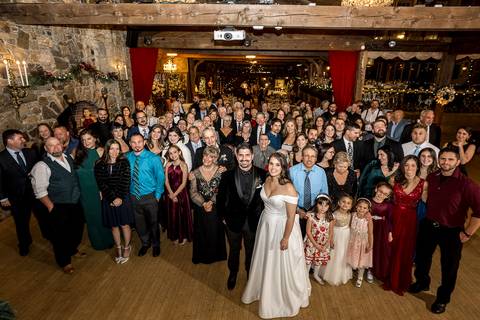 Laura and Lee’s joyful first dance beneath the twinkling lights of Bill Miller's Castle, as their family and friends cheer in the cozy reception hall.
Vanessa Trettel 
best wedding photographer in CT
'
