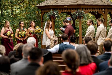 Scenic shot of the ceremony layout and guests watching Haily and Sean exchange vows in Middletown.
Vanessa Trettel Photography
Wedding photo at Pavillion on Crystal Lake | Middletown - CT'