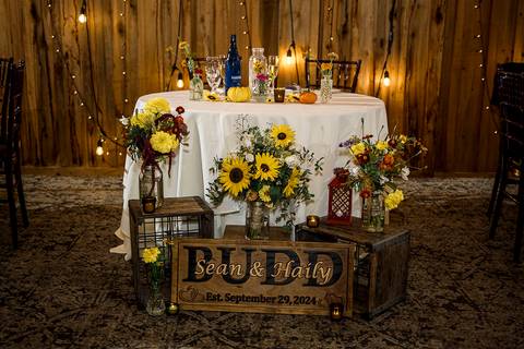 Elegantly decorated sweetheart table for the bride and groom featuring candles and florals at a CT wedding.
Vanessa Trettel Photography
Wedding photo at Pavillion on Crystal Lake | Middletown - CT'