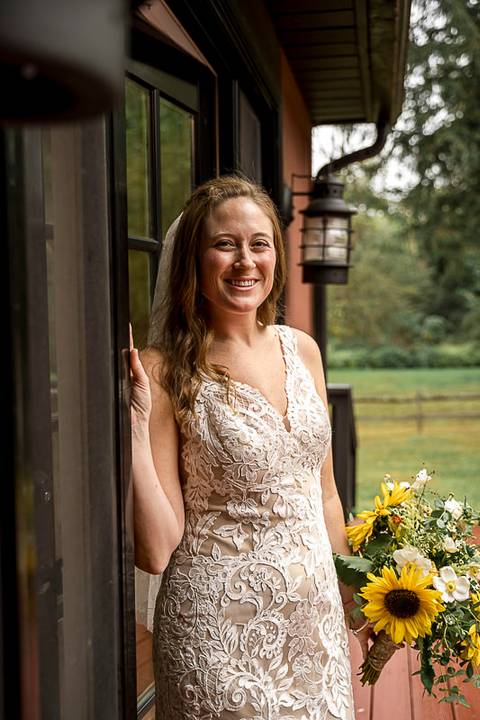 Candid portrait of a barefoot bride, Haily, smiling on her rainy wedding day at the Pavilion on Crystal Lake in Middletown, CT.
Vanessa Trettel Photography
Wedding photo at Pavillion on Crystal Lake | Middletown - CT'