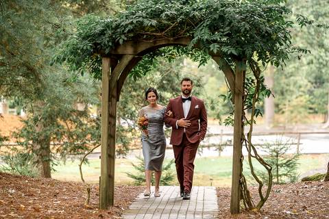 Sean walking down the aisle accompanied by his mother at their indoor-outdoor wedding ceremony in Middletown, CT.
Vanessa Trettel Photography
Wedding photo at Pavillion on Crystal Lake | Middletown - CT'