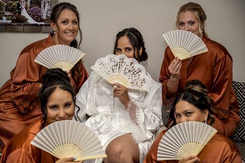 Bruna shares an emotional first look with her bridesmaids — laughter, tears, and cheers as they see her in her wedding dress for the first time.
wedding photographer in CT'