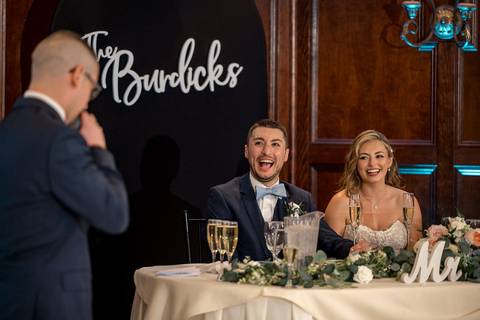 Guests laughing and striking poses in the PhotoDash booth — capturing the night’s fun energy.'