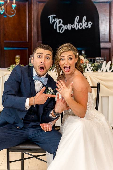 A spontaneous group photo bursting with laughter and movement on the dance floor.'