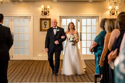 Bride come with her day in the island with a beautiful white dress.'