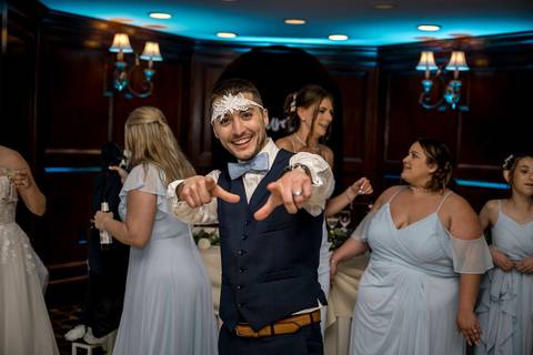 The garter toss turns into a hilarious moment of friendly competition.'