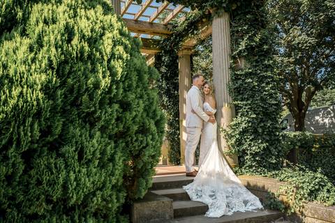 Walking into their future, hand-in-hand. So much love for these two! #Newlyweds #WeddingPhotos #EoliaMansion #Connecticut'