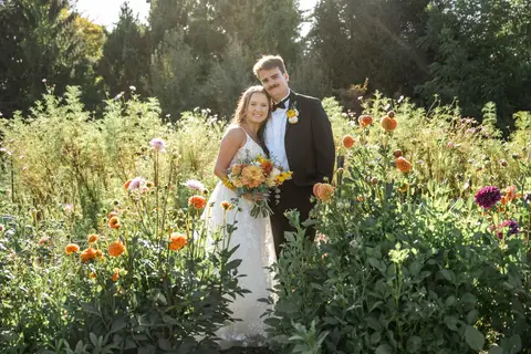 Moody artistic photo of the bride’s veil blowing in the wind, creating timeless romance at a Connecticut farm wedding venue.'