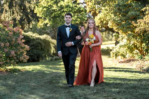 Elegant bridal party portraits with bridesmaids in soft summer tones and groomsmen in classic suits at Gastler Farm.'