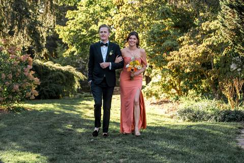 The groomsmen make a joyful entrance down the aisle, bringing smiles and excitement to Courtney & Rob’s summer wedding at Gastler Farm in Durham, CT.'