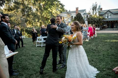 Emotional ceremony vows exchanged under the open sky, with rustic charm and heartfelt moments at Gastler Farm.'