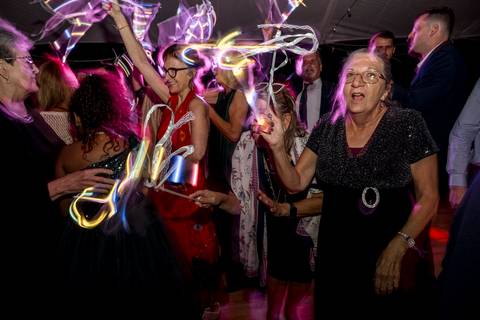 Lively reception party photos of guests dancing, laughing, and celebrating at Gastler Farm—capturing the fun of a CT wedding night.'