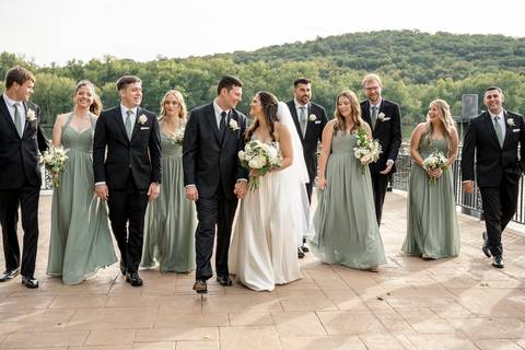 A third image of the wedding party highlights their connection—arms around each other, genuine laughter, and a boho, carefree energy.
Vanessa Trettel Photography'