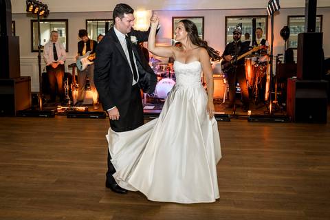 Another dance moment captures the bride spinning, her dress flowing as music fills the room.
Vanessa Trettel Photography'
