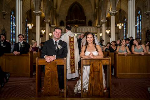 The first kiss, captured in a soft, romantic frame, with guests slightly blurred behind them. The light wraps around them, highlighting the intimacy of the moment.
Vanessa Trettel Photography'
