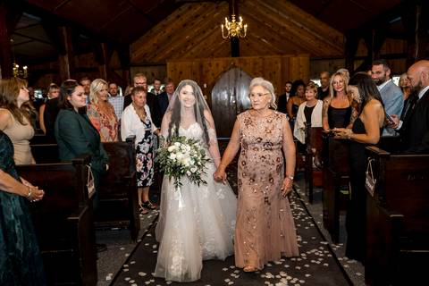 Kiara's stunning entrance to the Aqua Turf Club chapel. The look on her face says it all! Emotional walk down the aisle.'