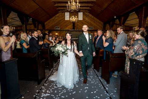 You may now kiss the bride! First kiss as husband and wife inside the Aqua Turf Club chapel. Pure joy captured!'