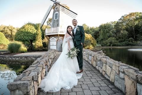 Guests mingling and celebrating the happy couple during the lively cocktail hour at the Aqua Turf Club. Fun New England wedding photography.'